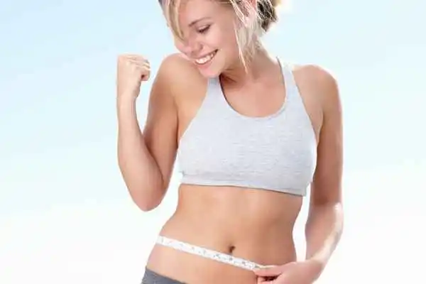 woman happy after fat reduction treatment Greater London (Merton)