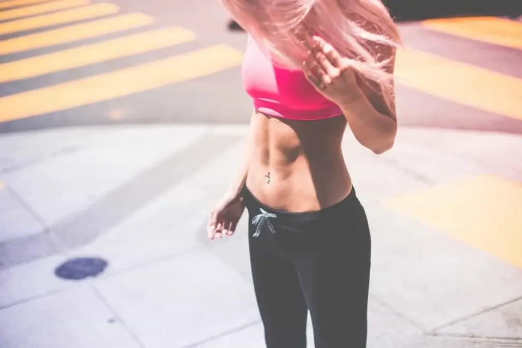 Woman with toned stomach after LA-EMS Body Sculpting Treatment Greater London (Merton) 